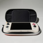 Image showing AYANEO 2 & Geek Orange Hardshell Case with AYANEO 2 Retro Power included